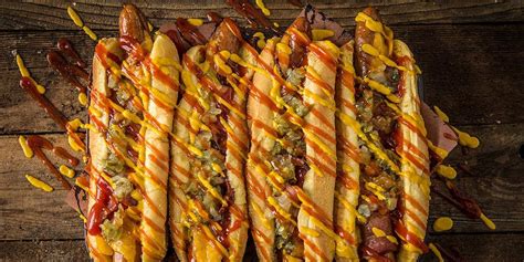 Grilled Bacon-Wrapped Hot Dogs Recipe | Traeger Grills