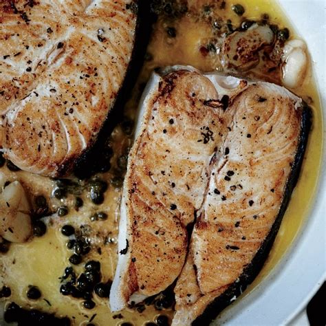 Butter-Basted Halibut Steaks with Capers Recipe | Epicurious
