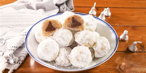 Best Chocolate Kisses Snowball Cookies Recipe - Delish