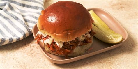 Best Slow-Cooker BBQ Pulled Chicken Recipe - Delish