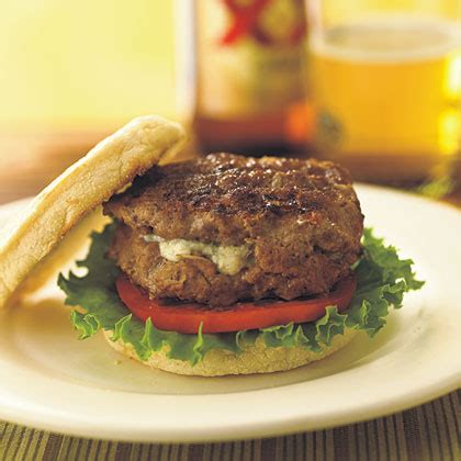 This recipe for blue cheese-stuffed burgers is sure to …